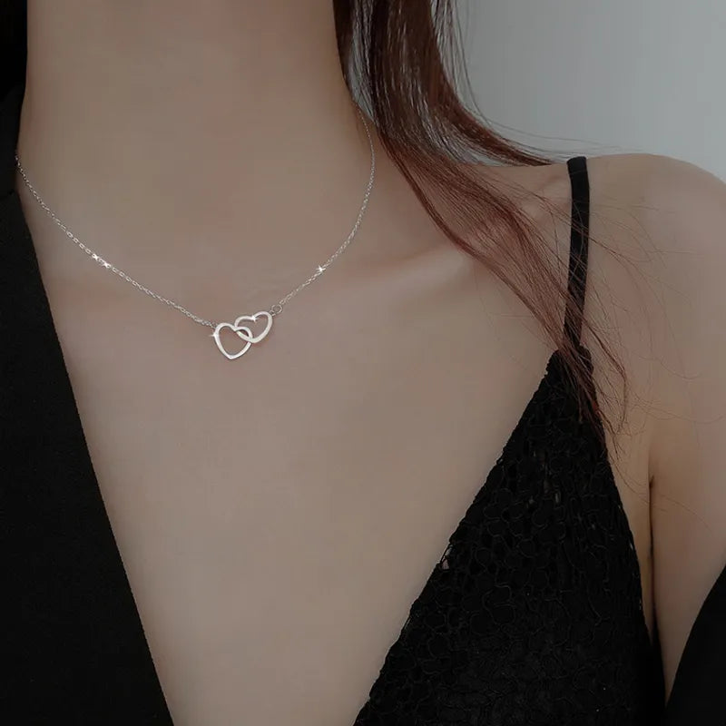 LINKED SILVER HEARTS NECKLACE